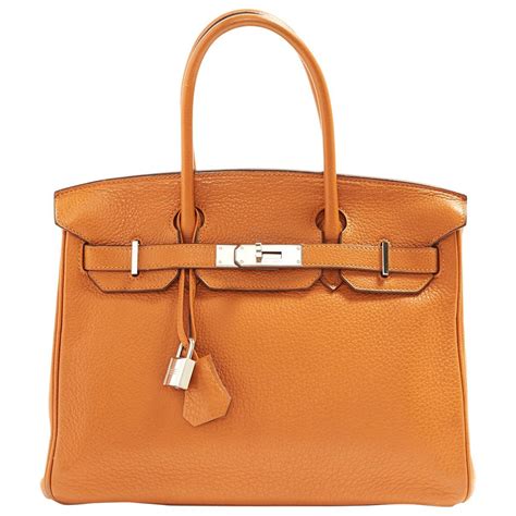 who owns hermes bags